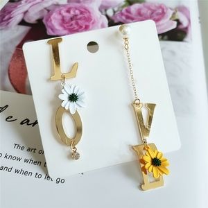 LOVE ASYMMETRIC EARRINGS